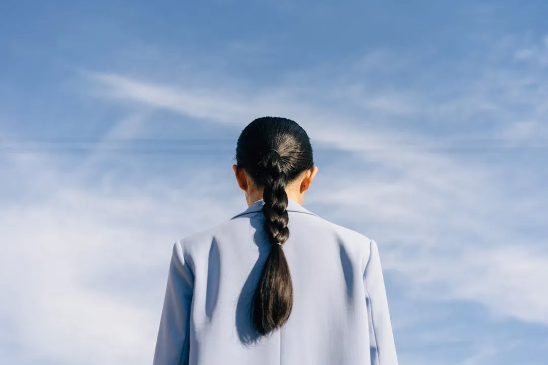Woman with a blue suit. 