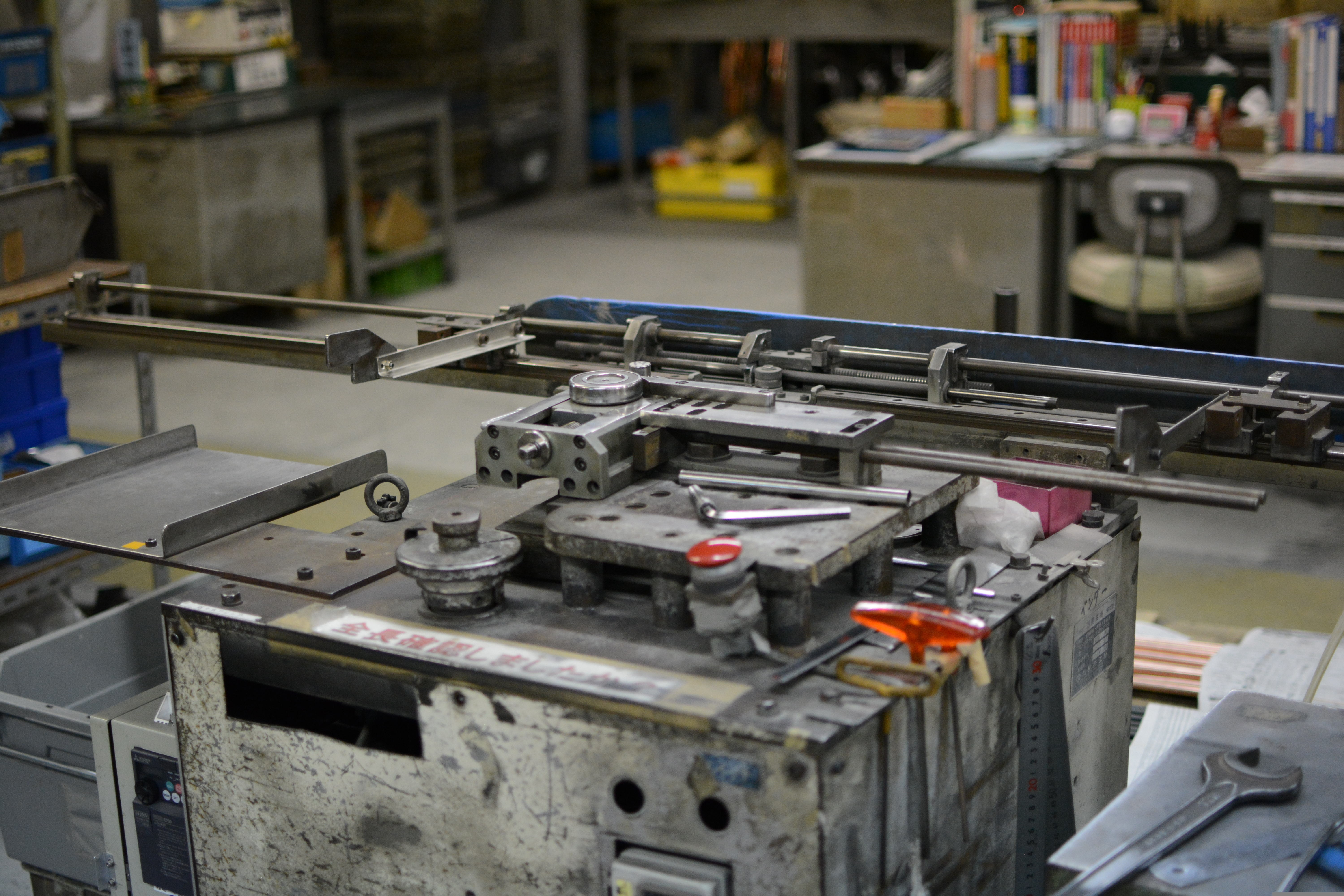 Industrial manufacturing equipment inside a production facility.