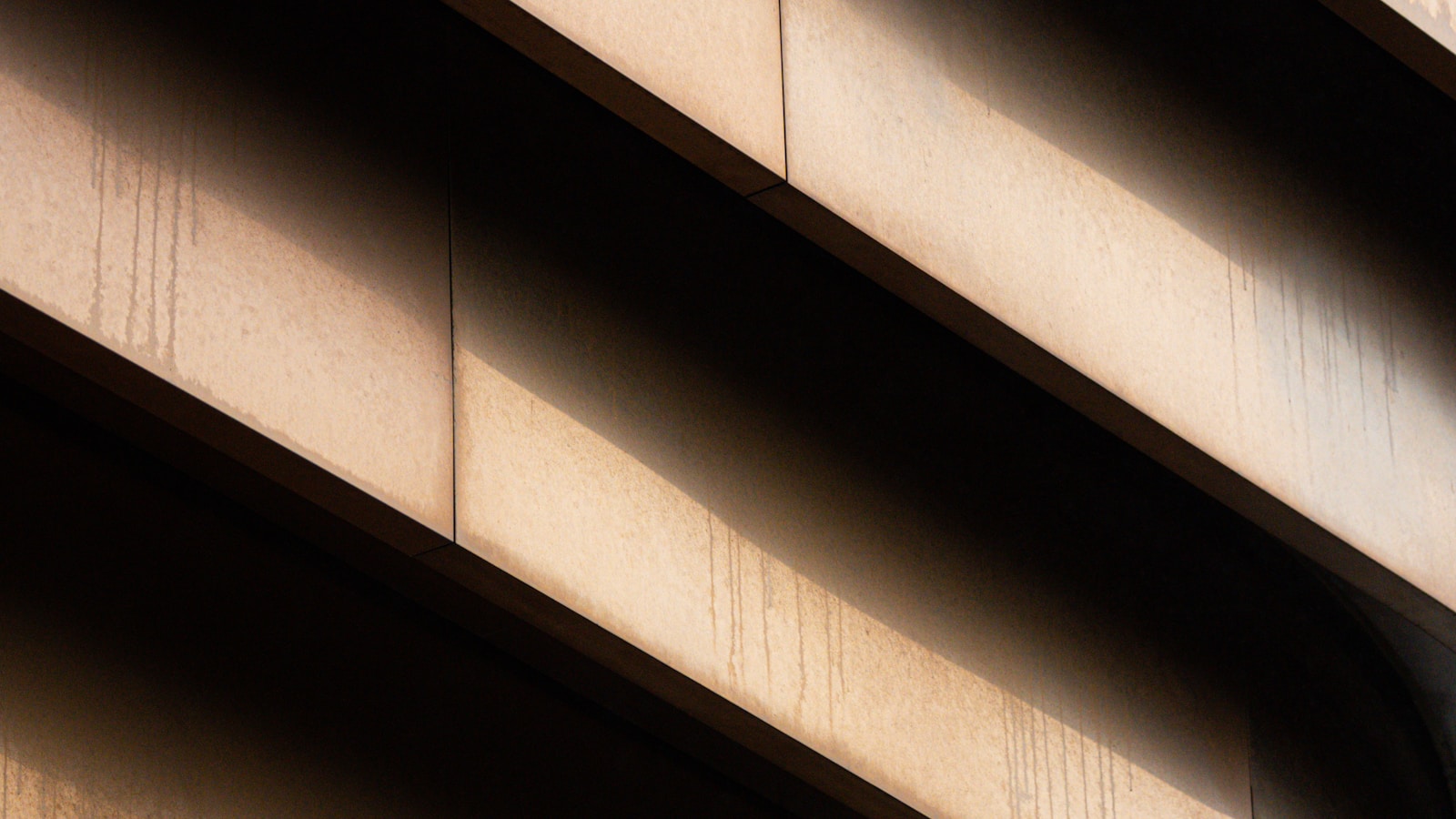 Curving architectural lines with dramatic light and shadow, symbolizing heightened discretionary review in immigration adjudications.