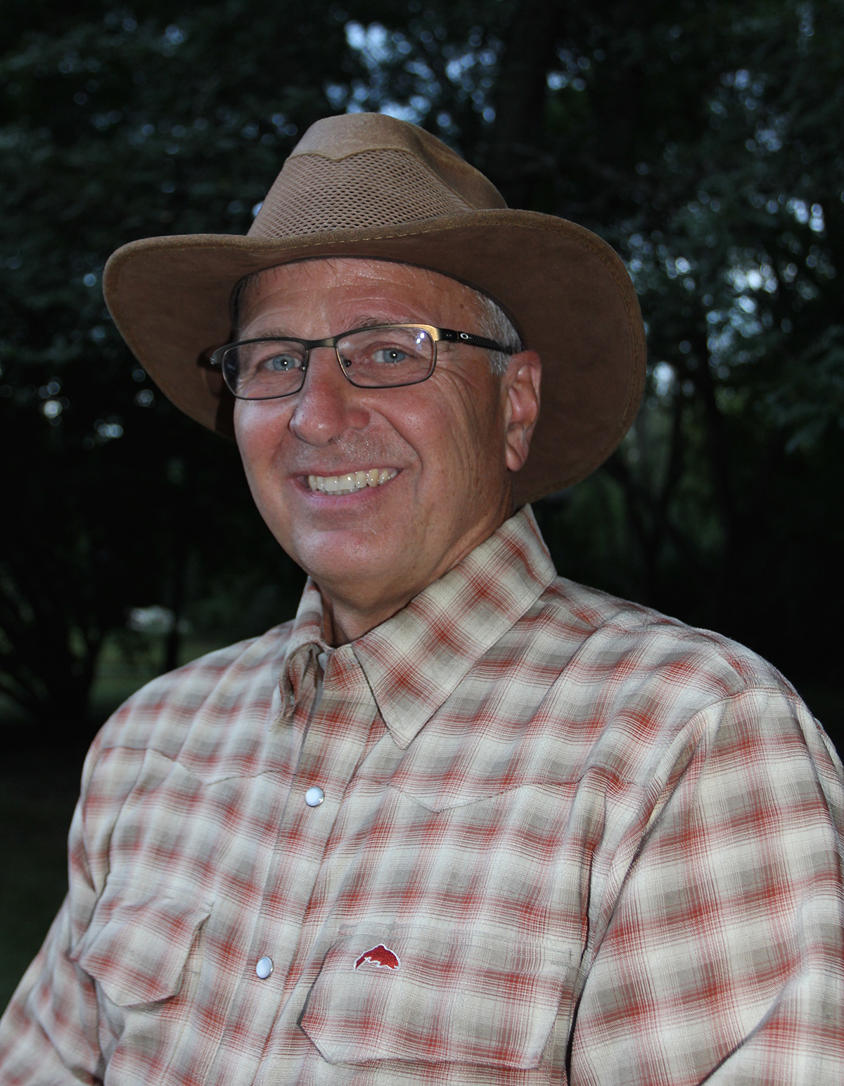 image of a river cleanup by volunteers, for an environmental conservation nonprofit