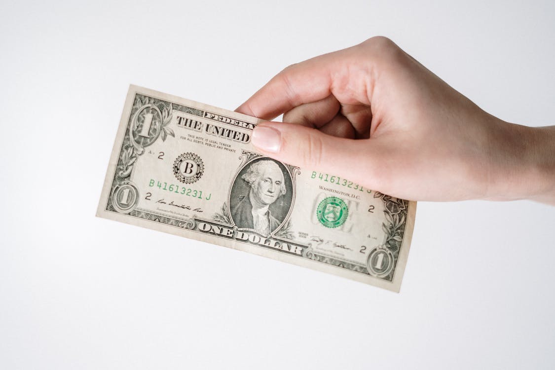 Picture of a dollar bill representing the cost of talent