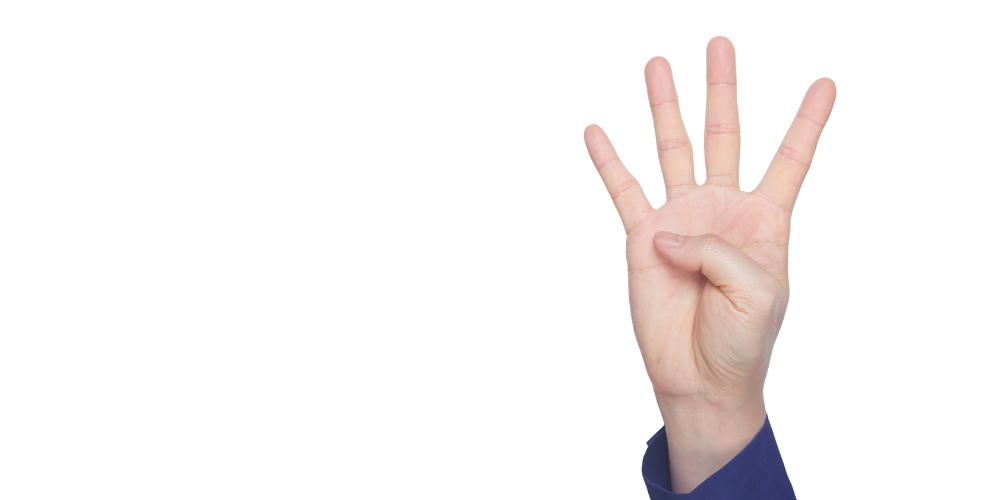 A hand raising 4 fingers
