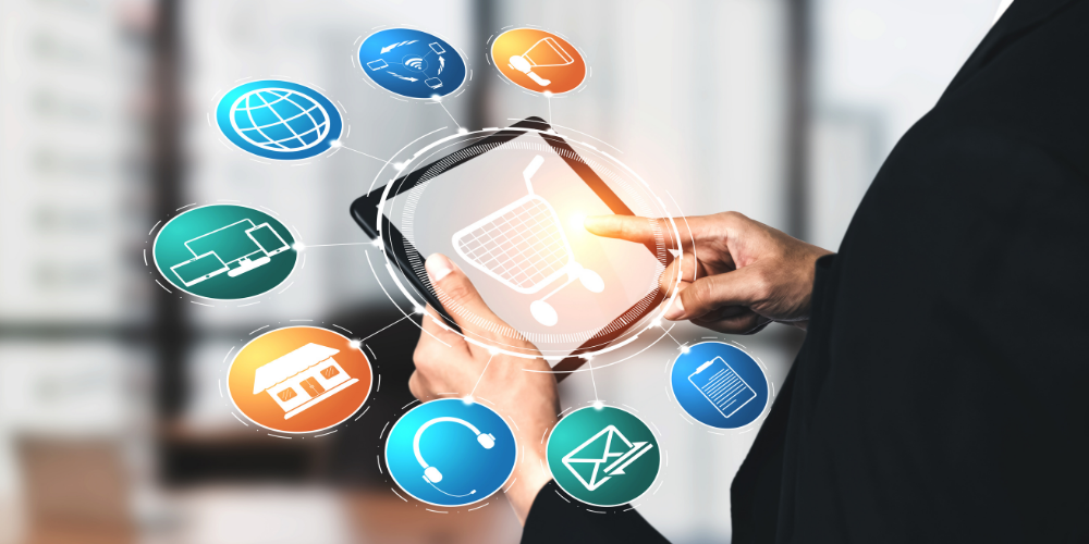 A businessman is interacting with a digital interface with various e-commerce and online business icons, signifying a concept related to digital marketing or online commerce.