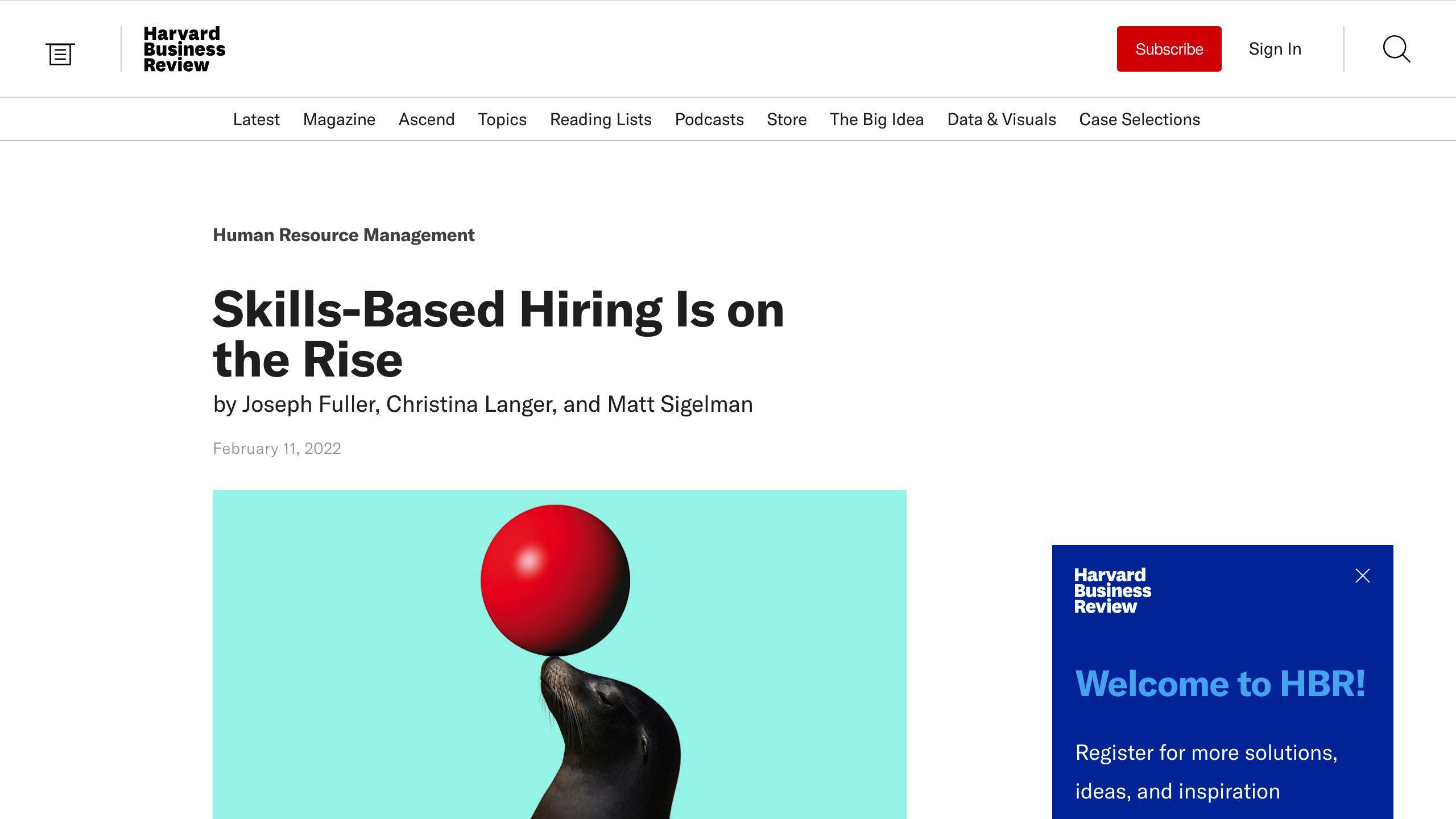 The top section of a Harvard Business Review article titled "Skills-Based Hiring Is on the Rise" by Joseph Fuller, Christina Langer, and Matt Sigelman, published on February 11, 2022, with an abstract image of a seal balancing a red ball on its nose.