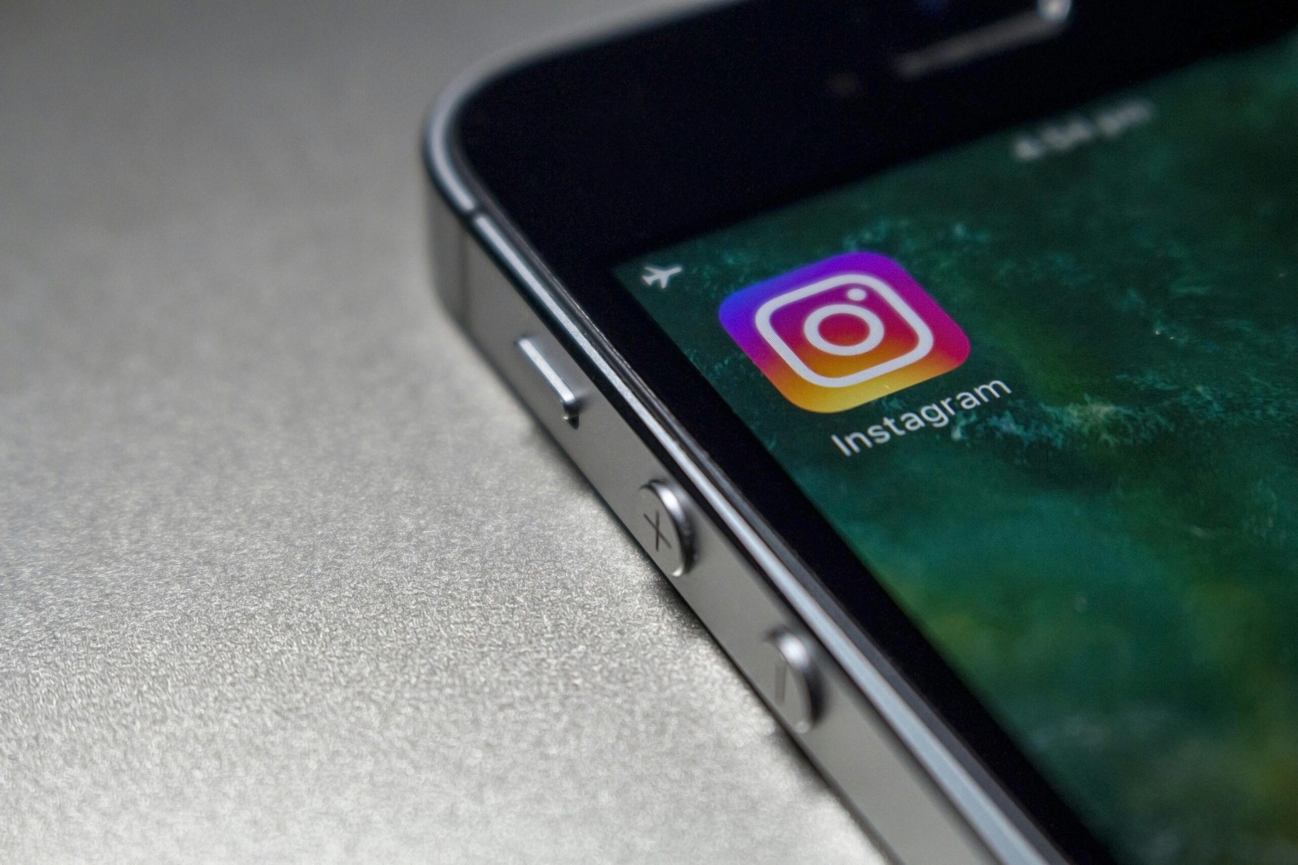 Close-up of a smartphone screen displaying the Instagram app icon.