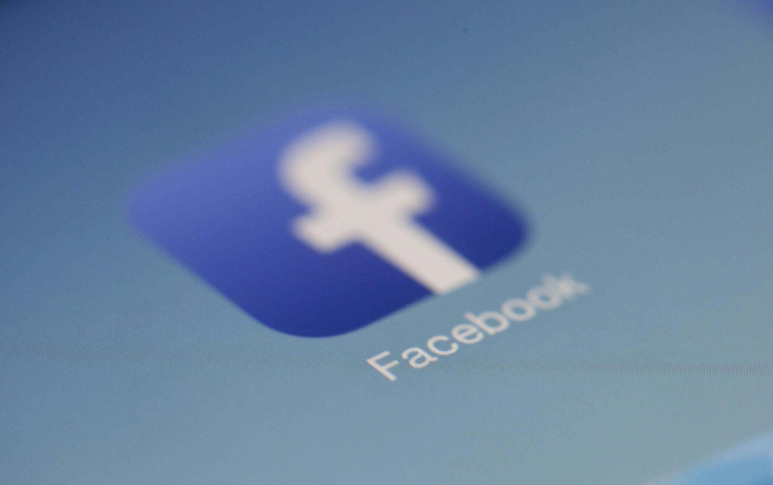 Close-up of the Facebook app icon on a smartphone screen.