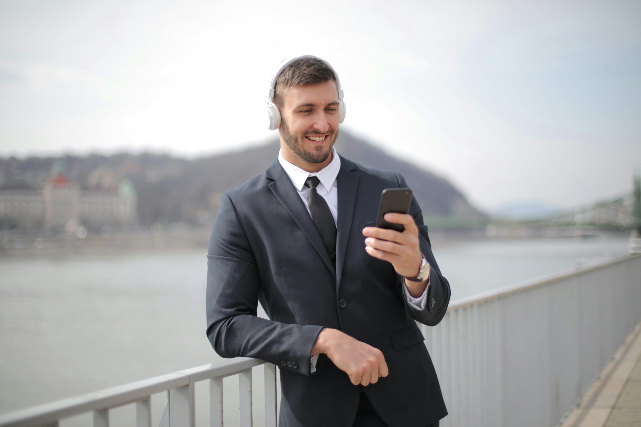 A business professional enjoying a successful moment, a testament to the potential of hired talent.