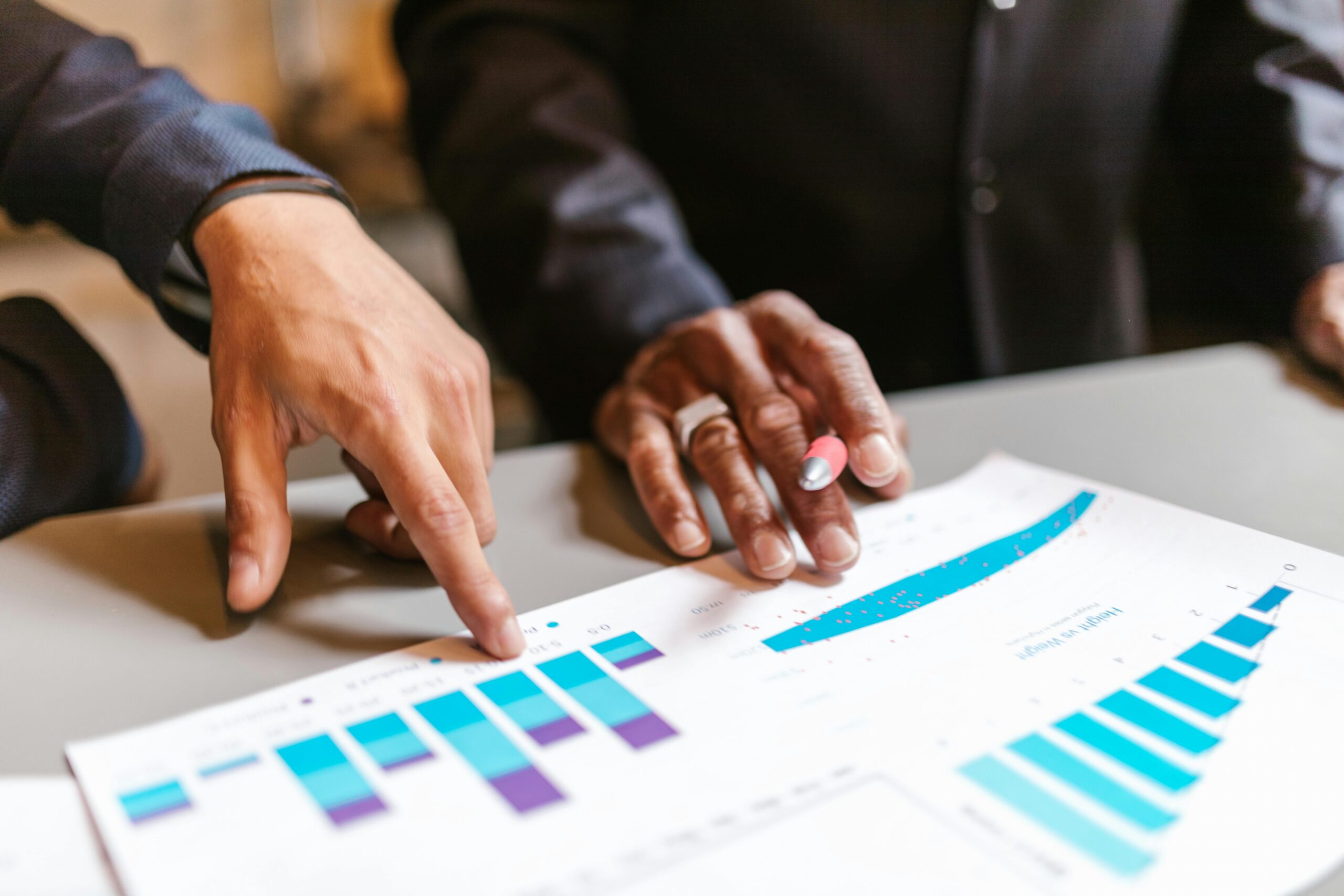 Professionals analyzing SEO data, highlighting the analytical phase of SEO projects.