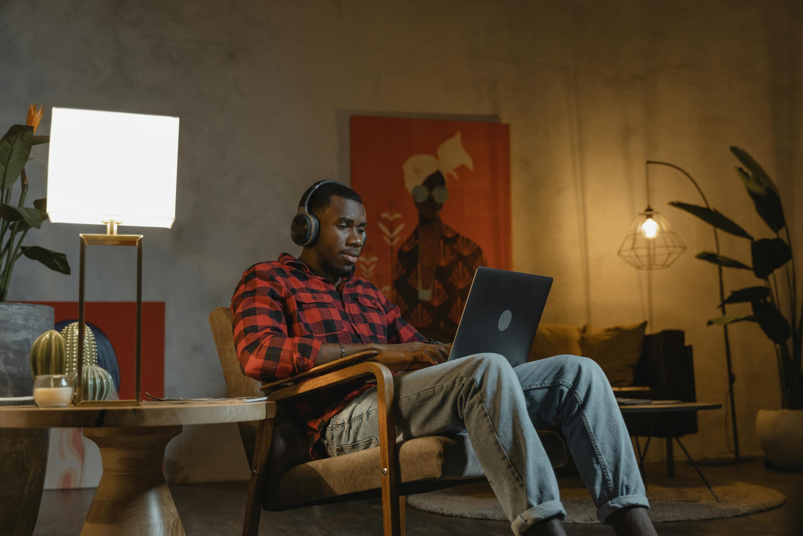 Man working remotely from a cozy home environment, highlighting remote work culture.