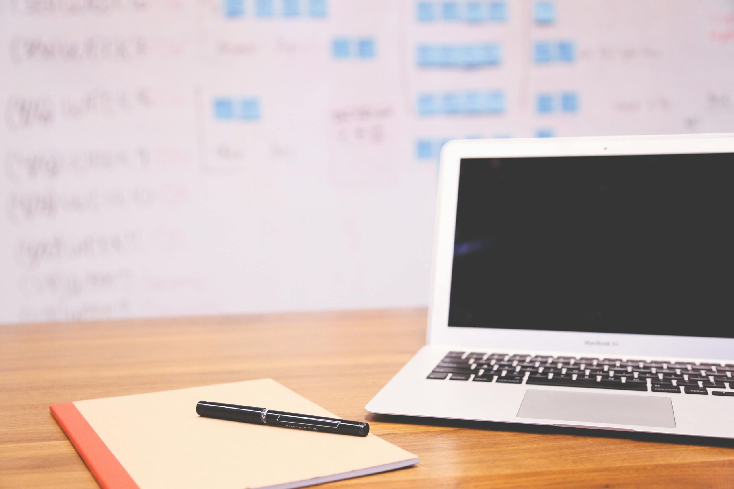 Remote project management setup with laptop.