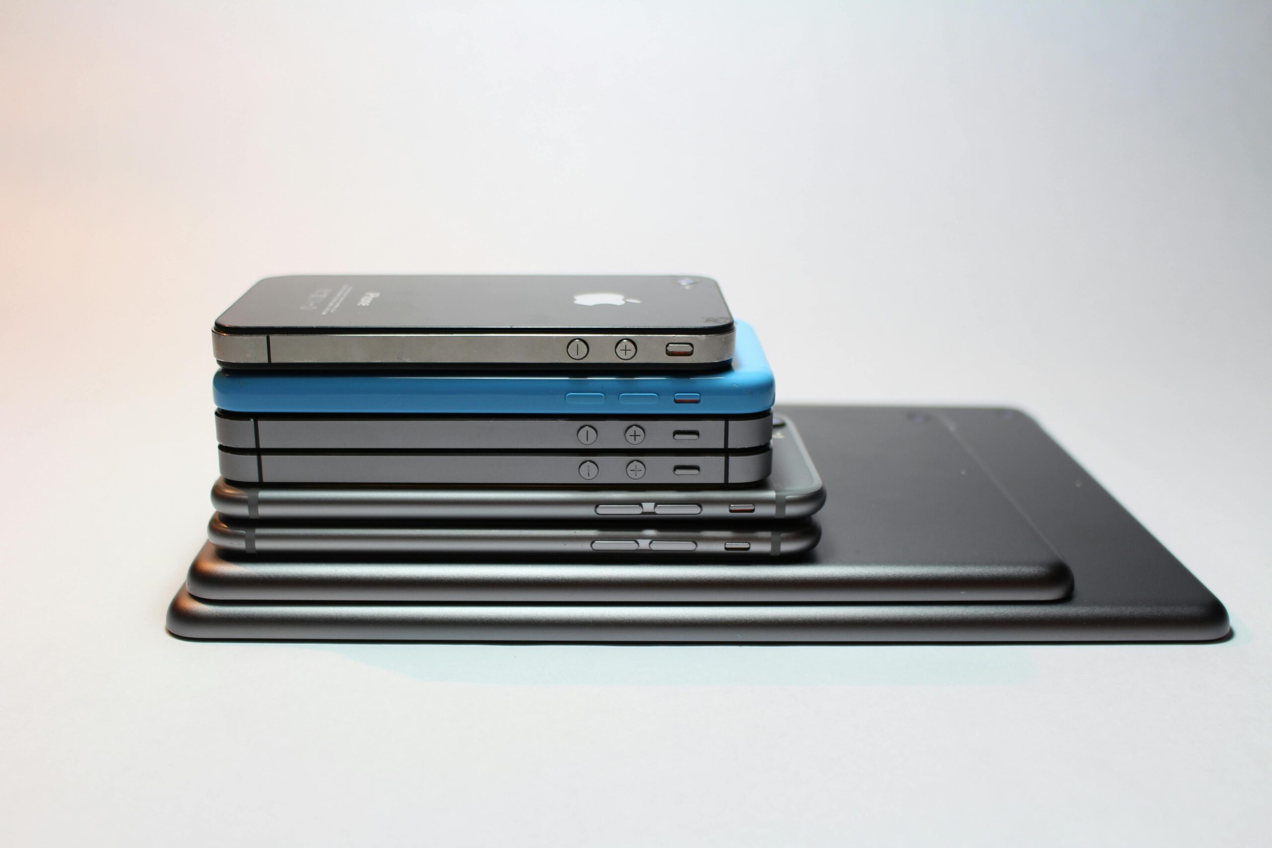 Stack of iPhones representing the product element of the marketing 4Ps.