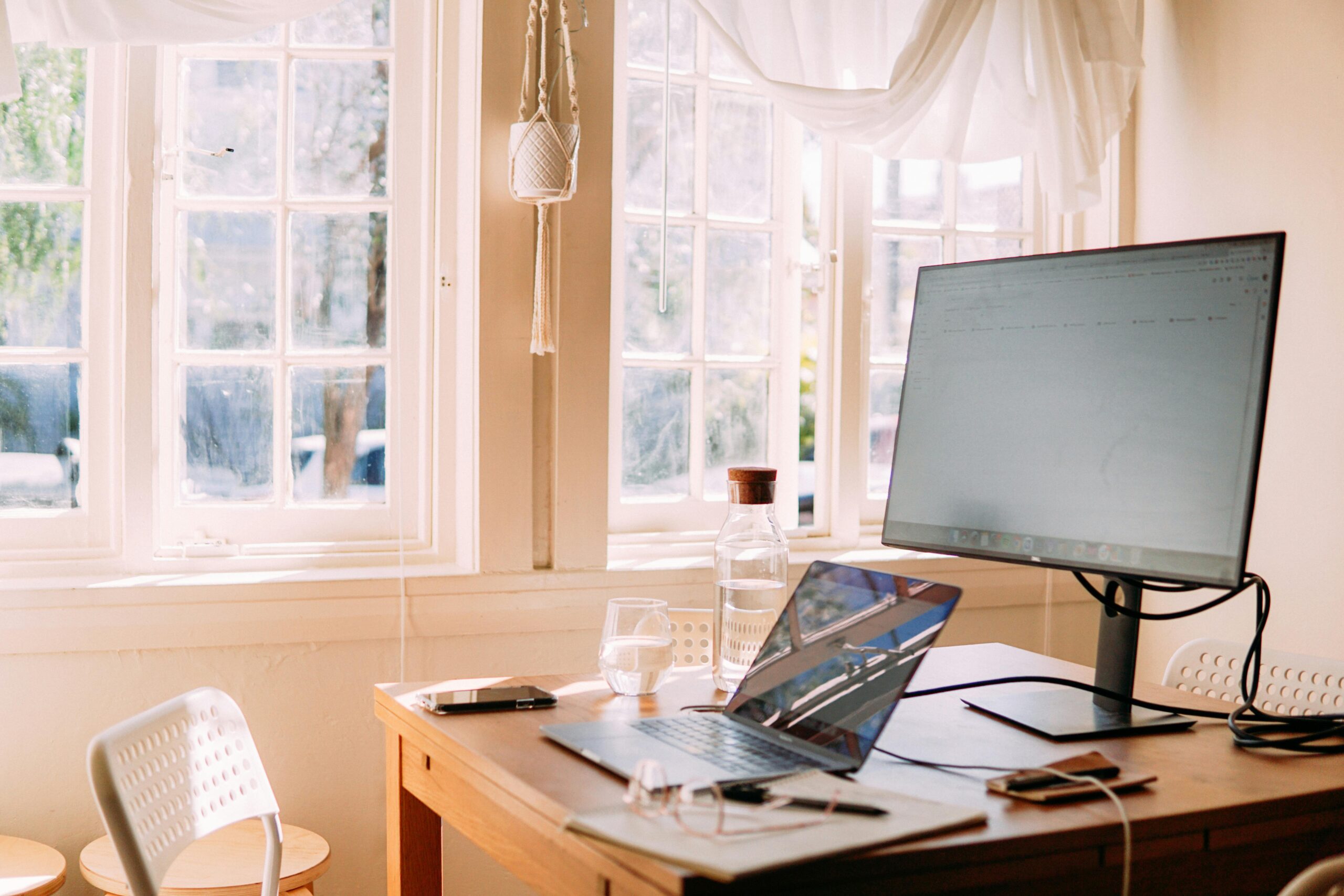 Remote HR manager's bright and organized home office workspace.