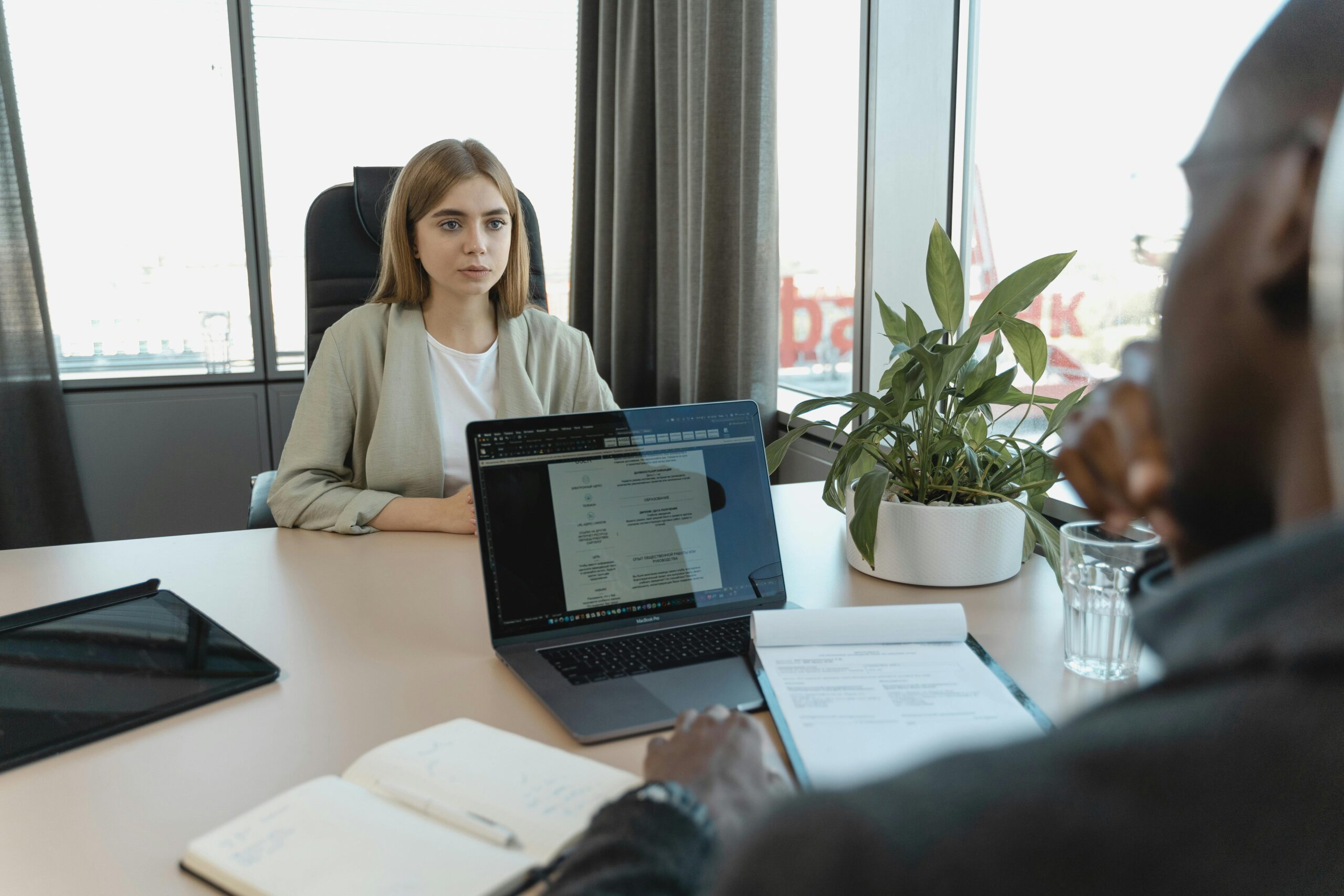 A group meeting discussing recruitment strategies at recruitment outsourcing companies.