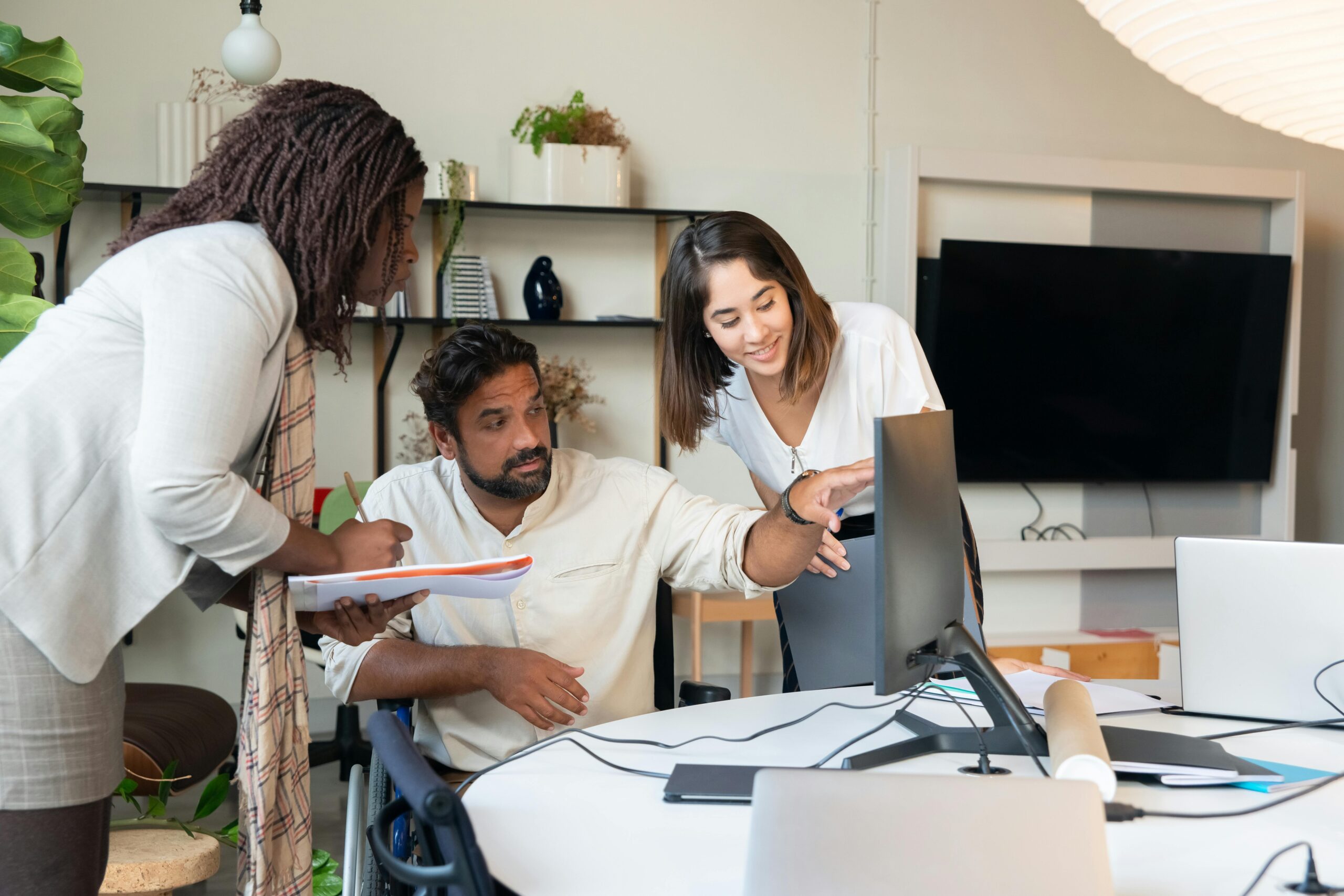 Diverse team collaborating on a project .