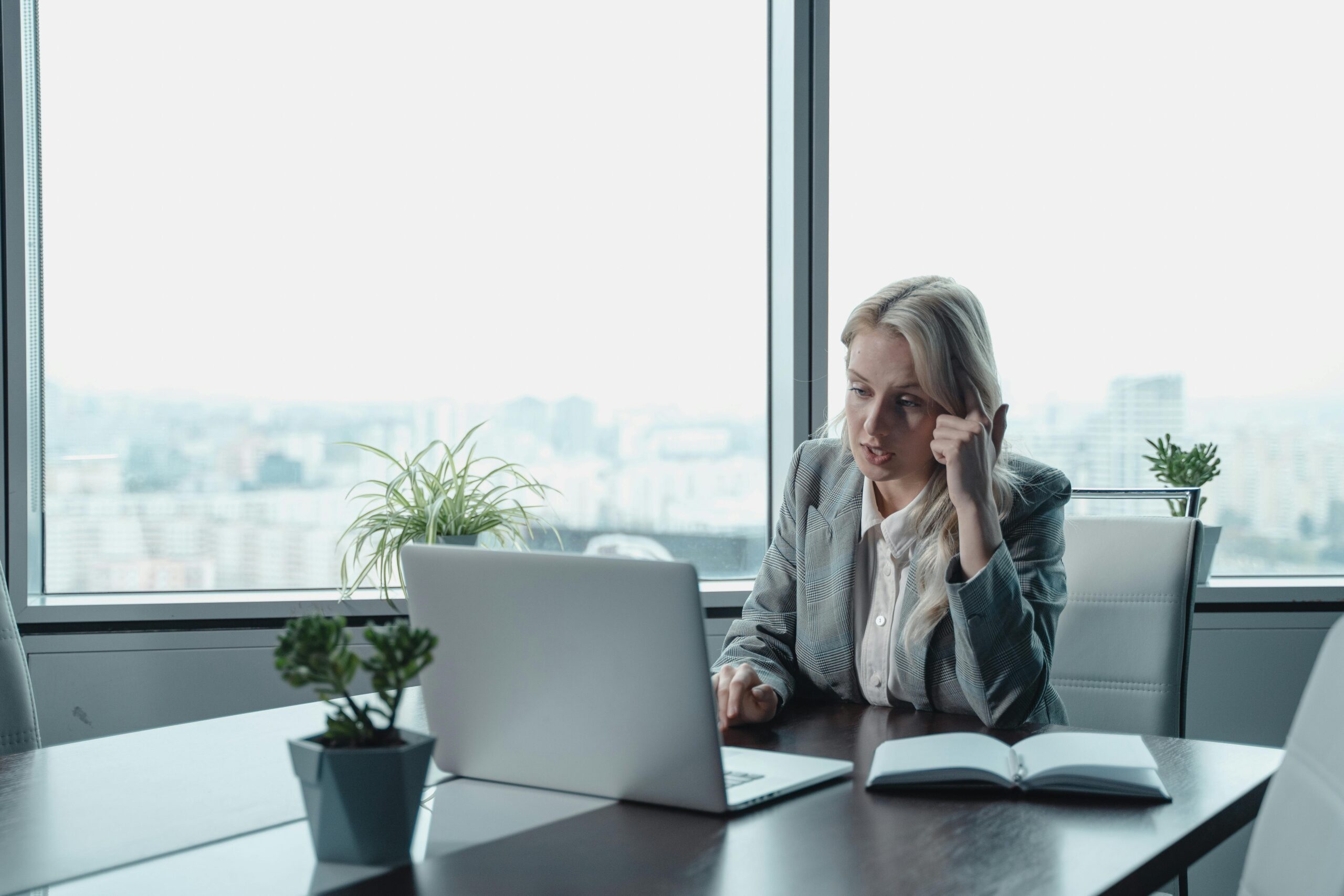 Professional woman at a desk.
