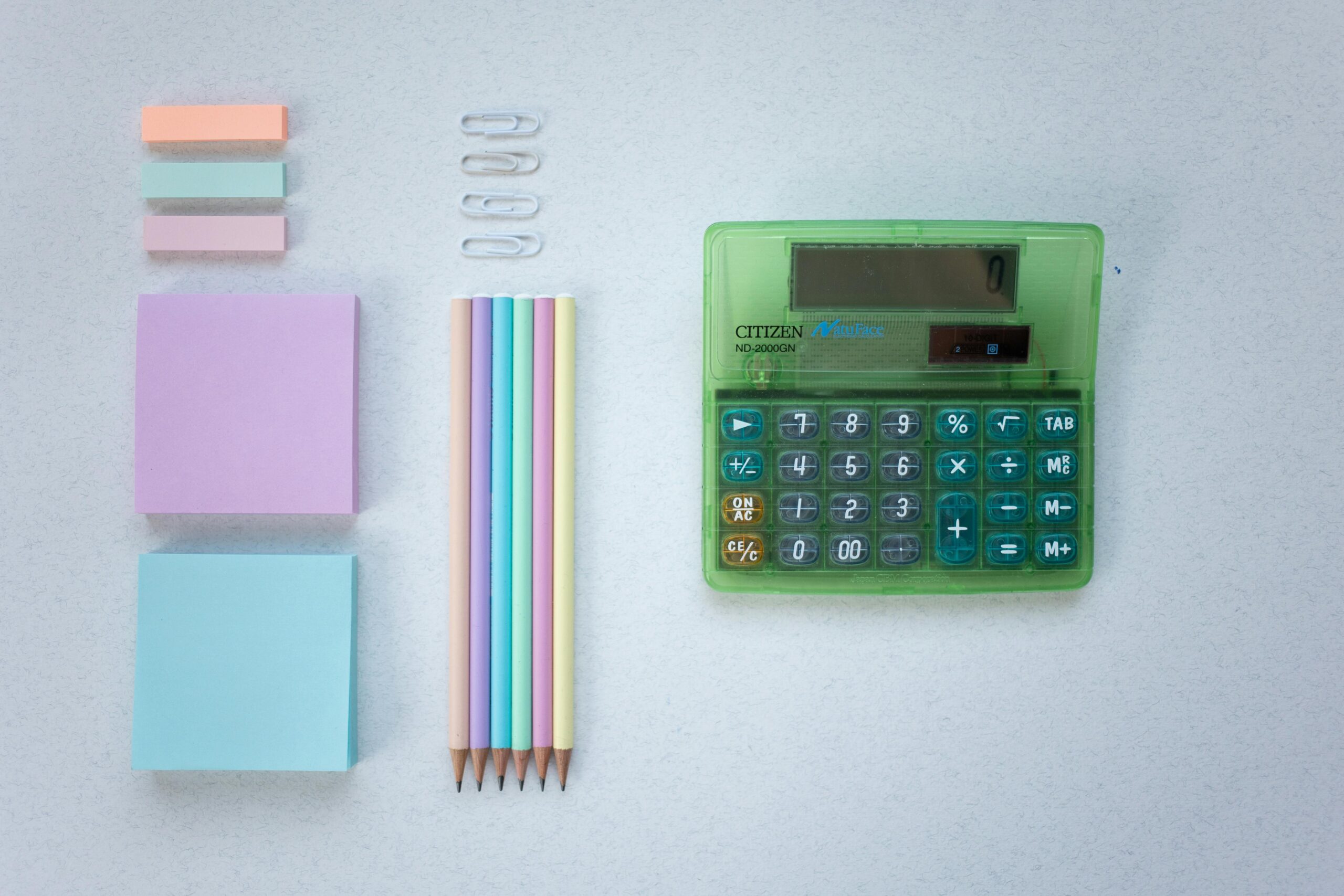 Organized stationery and calculator.