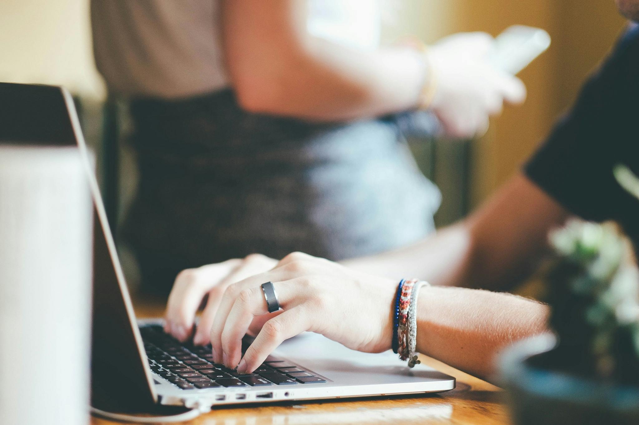 Email strategist working on a laptop.