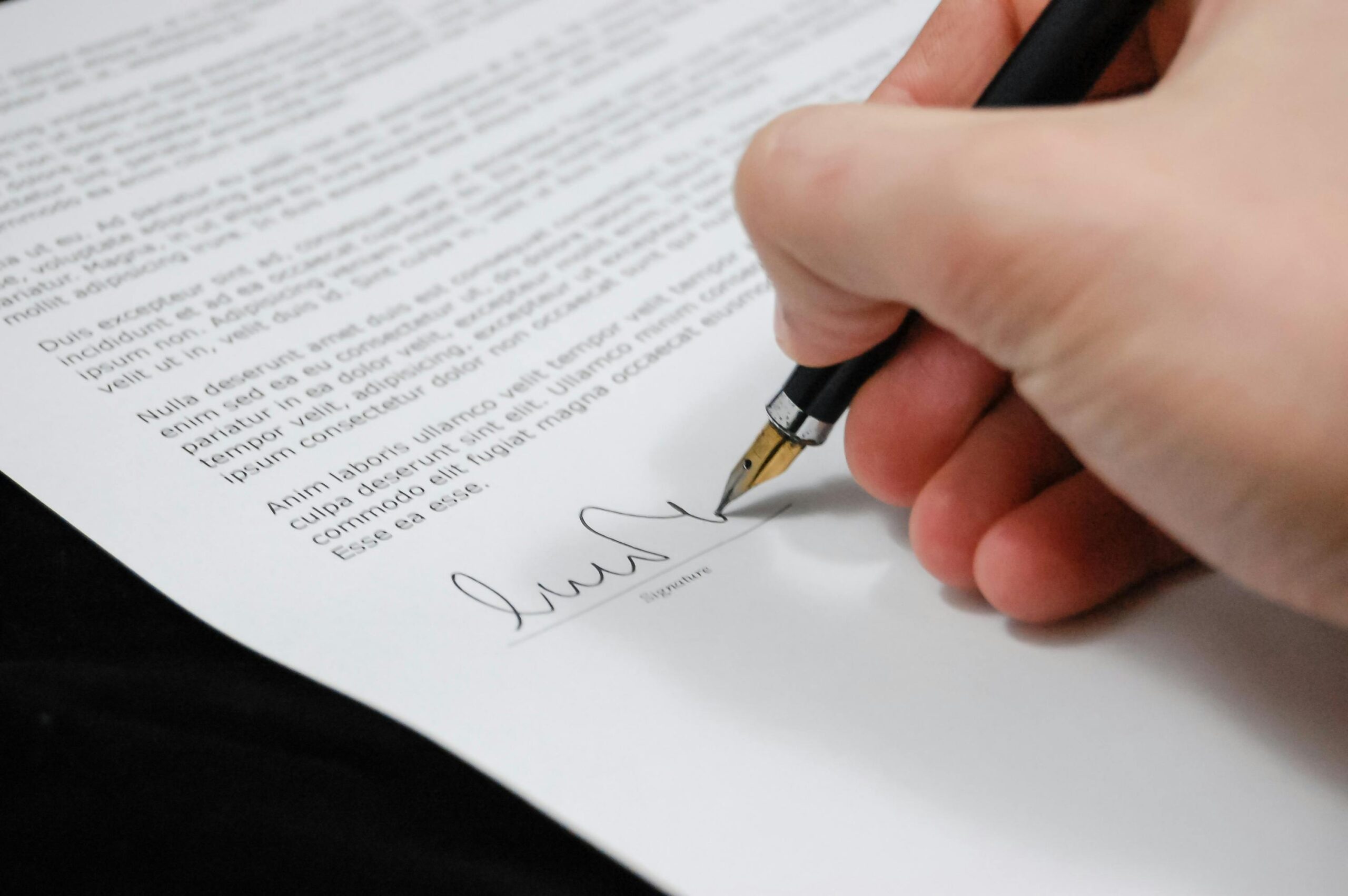 Signing contract to hire overseas employees.