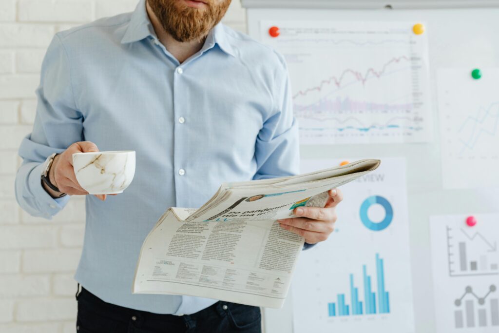 Professional reviewing financial reports and charts on sales operations leader salary trends.