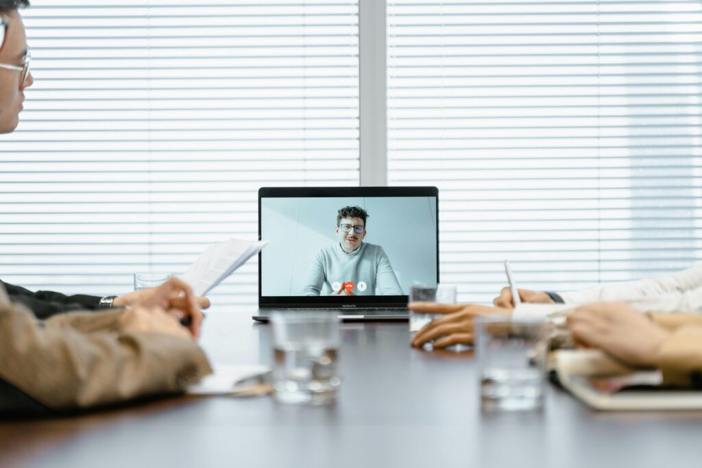 Virtual meeting discussing outsourced sales solutions with team members.
