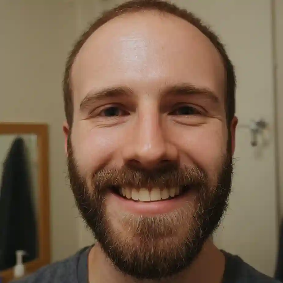 A man smiling for a selfie