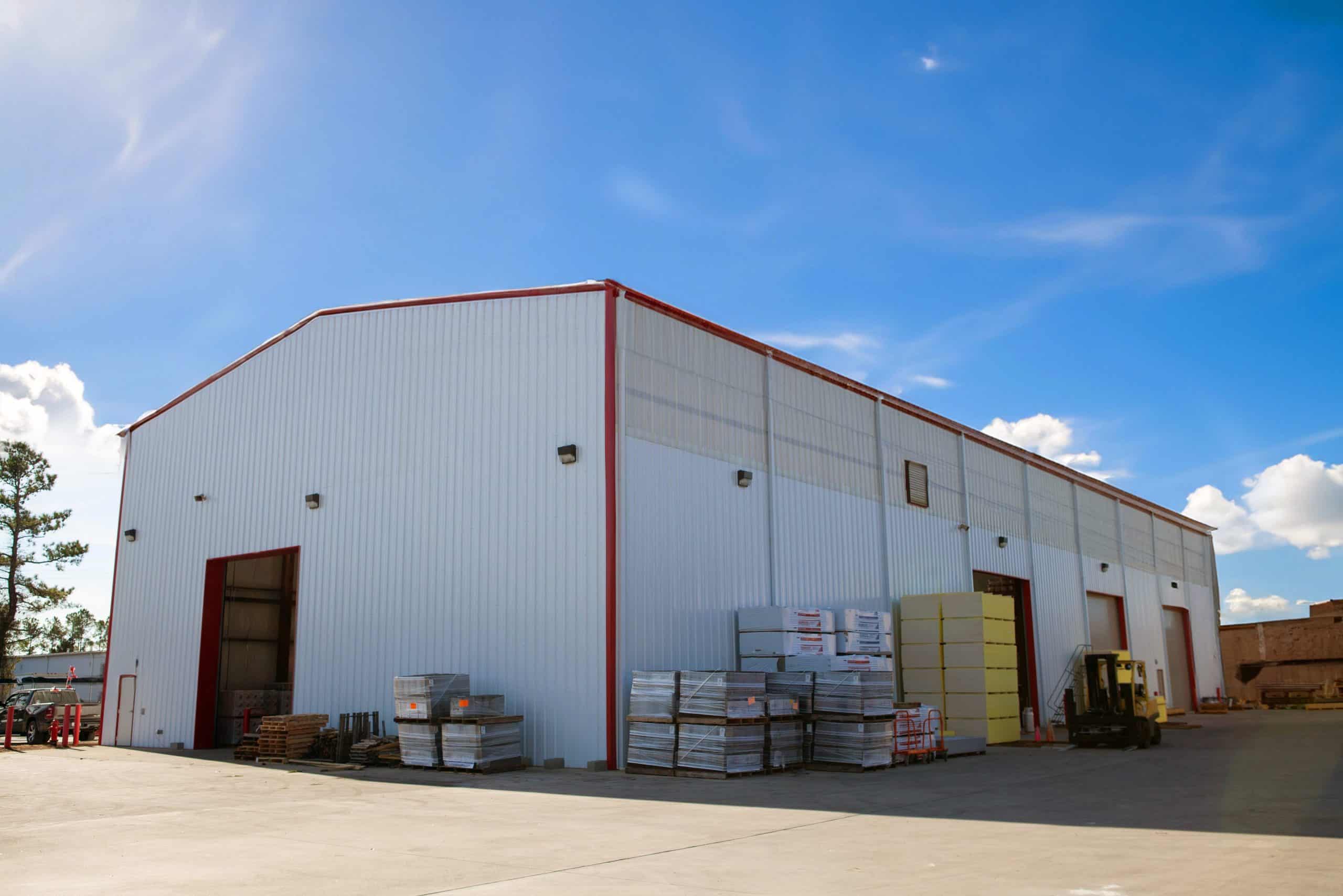 L&W Supply warehouse exterior with loading doors and stacked materials in Myrtle Beach, SC.