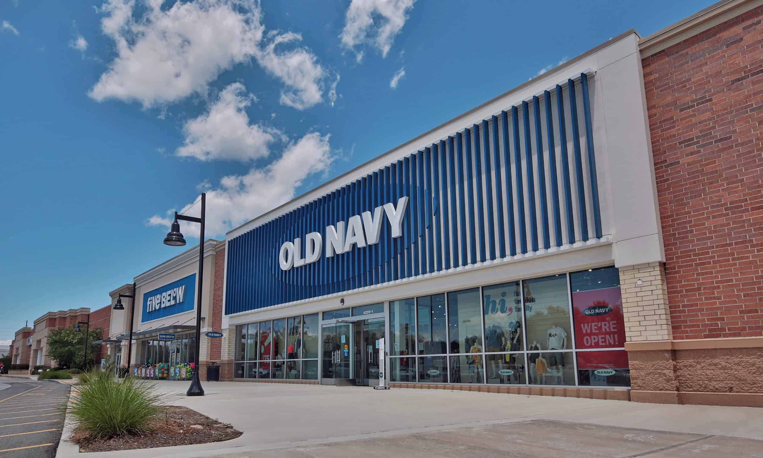 Old Navy storefront and shopping-center sidewalk in Evans, GA.