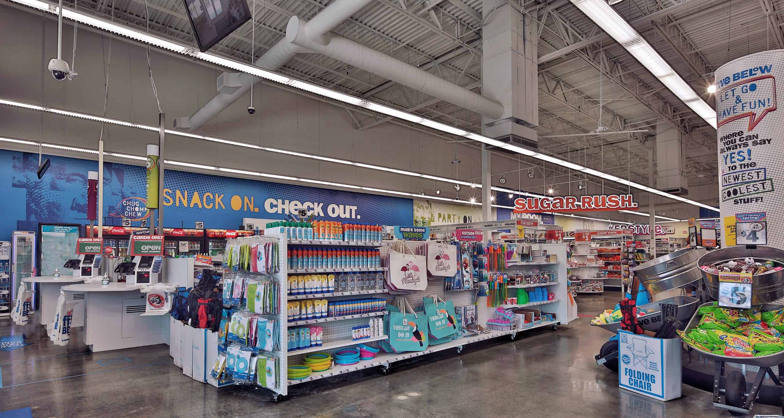 Checkout stations and merchandise displays at Five Below in Evans, GA.