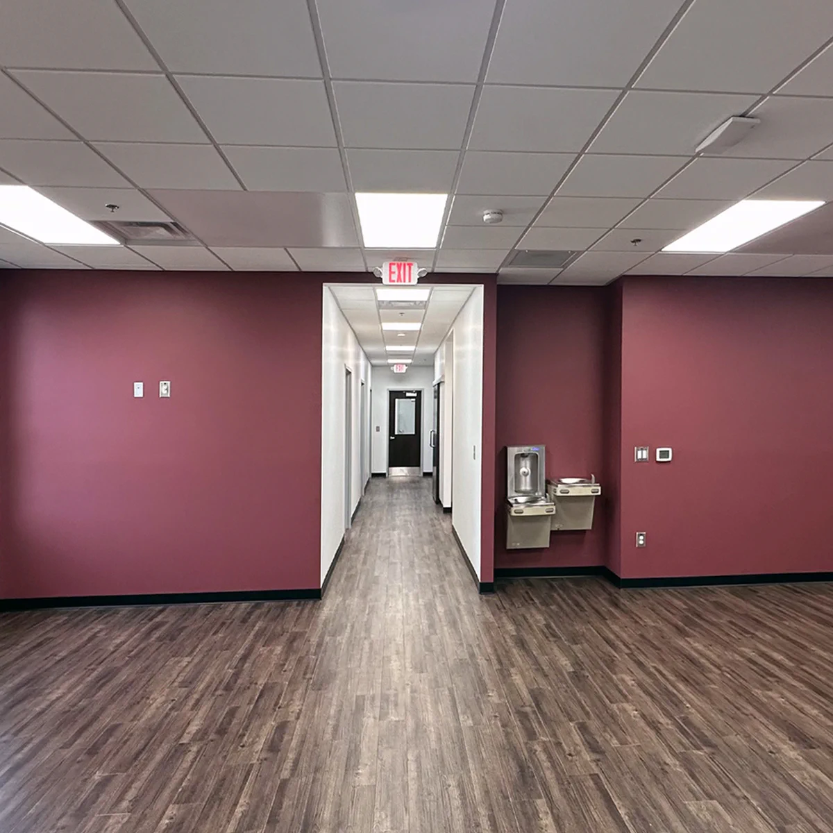 Interior hallway with drinking fountains at Socastee Fire Station 1 in South Carolina.