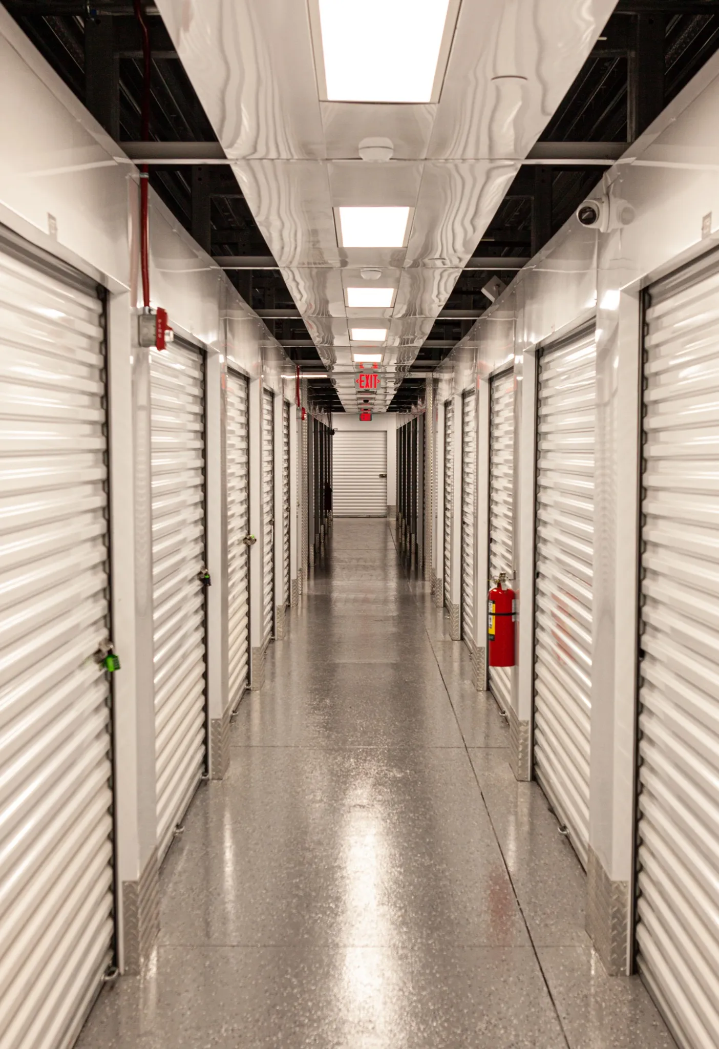 Long aisle of roll-up storage doors at Extra Space Storage in North Myrtle Beach.