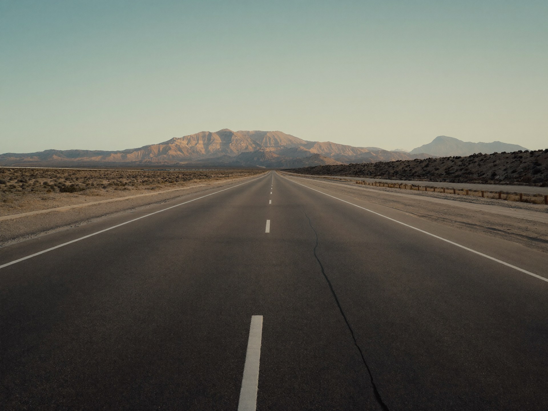 Desert proving ground road at sunrise
