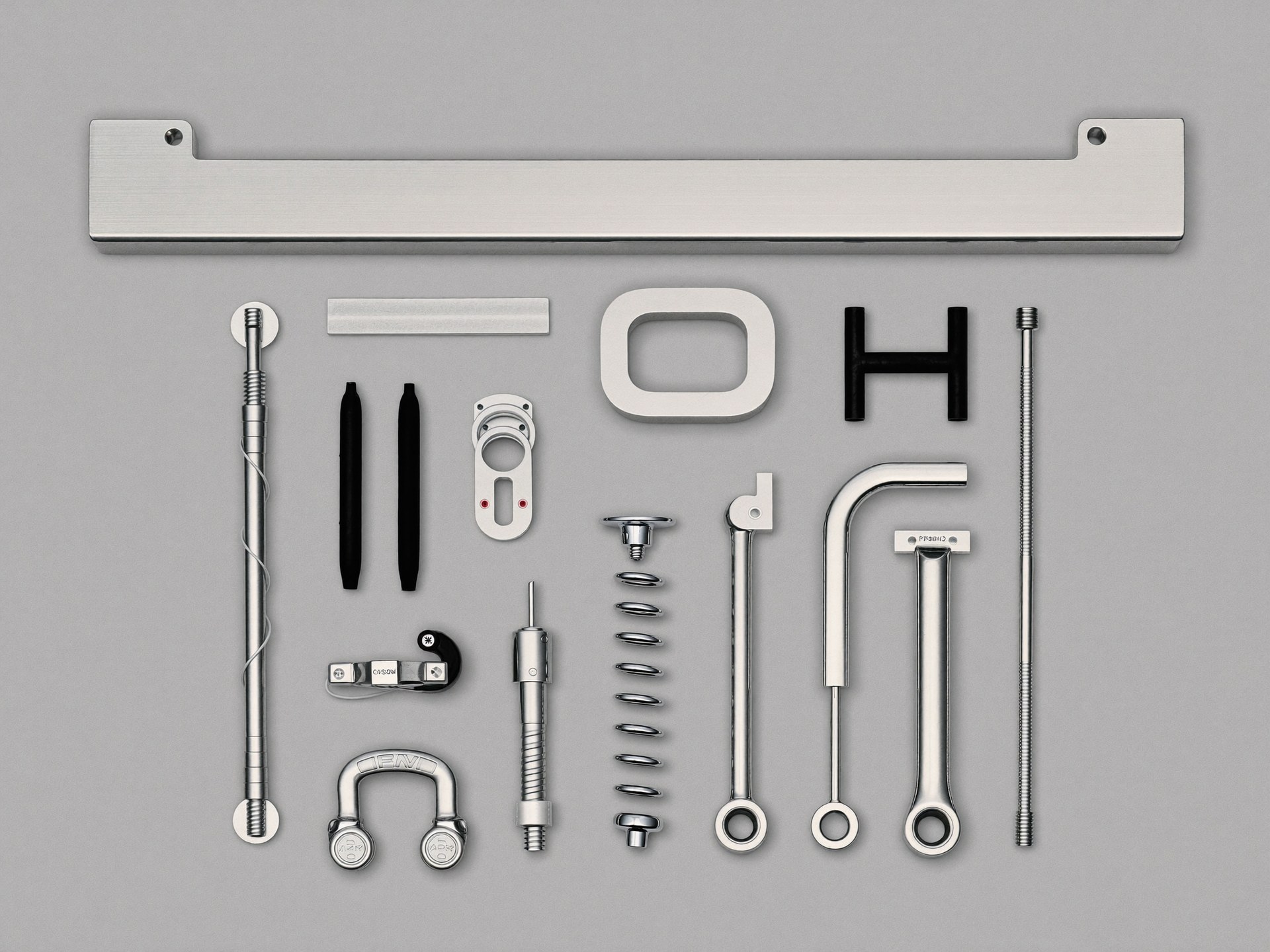 Retrofit hitch kit components in a flat lay