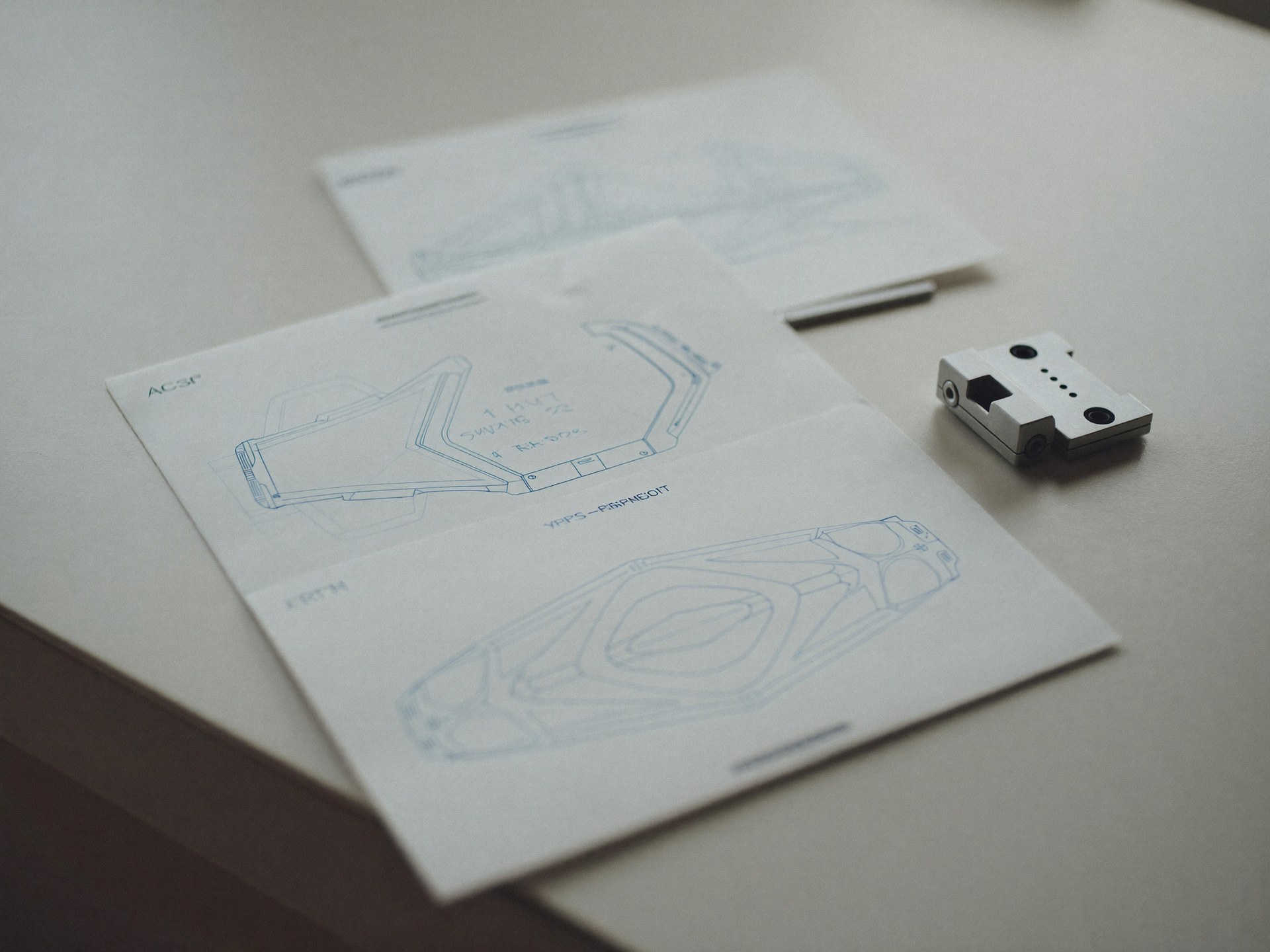 Patent line drawings beside a machined aluminum component
