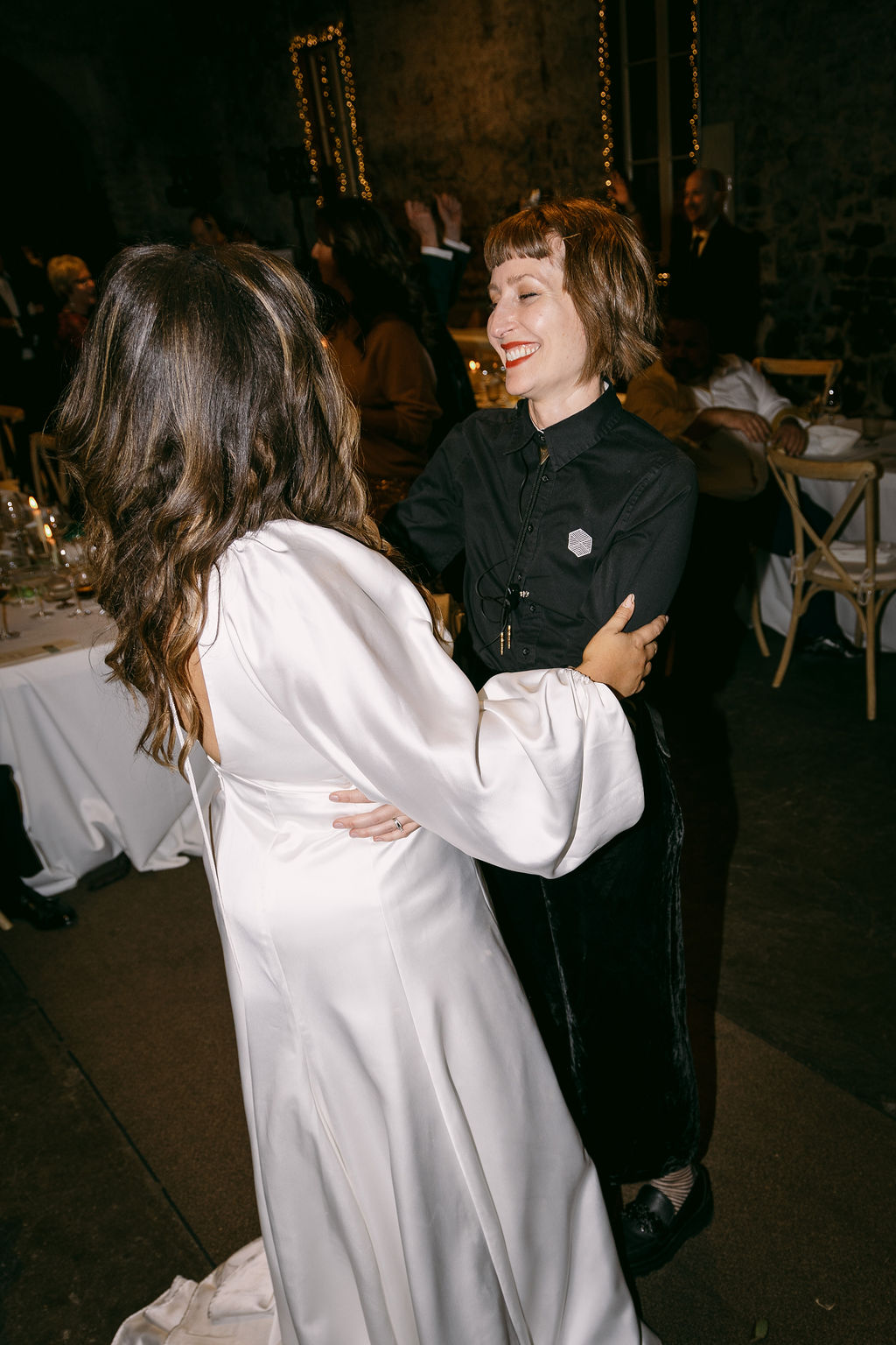 Goodstock owner, Amy being friendly to the bride at wedding party. 