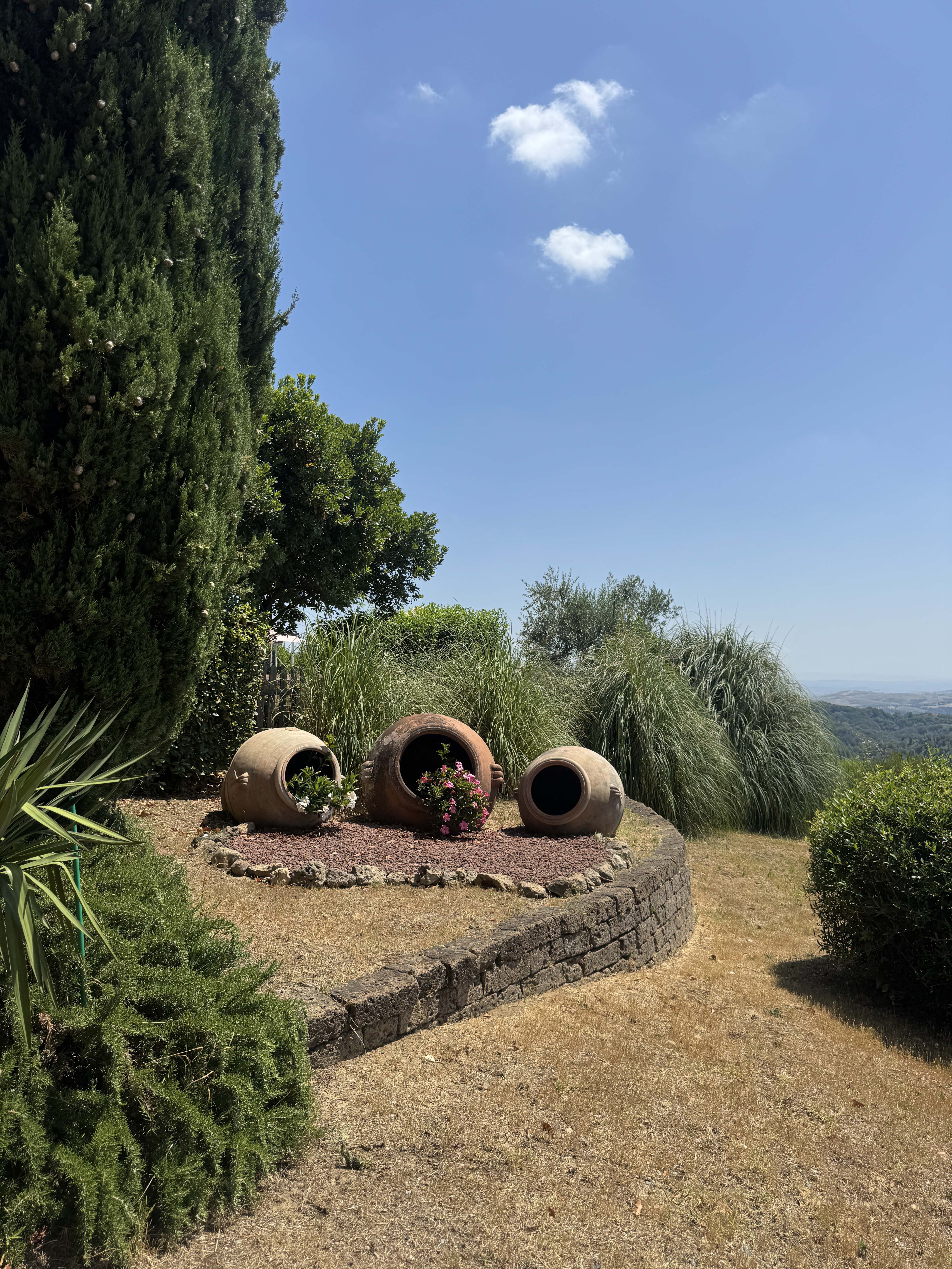 Tuscany garden with terracotta pots for an Italian destination wedding