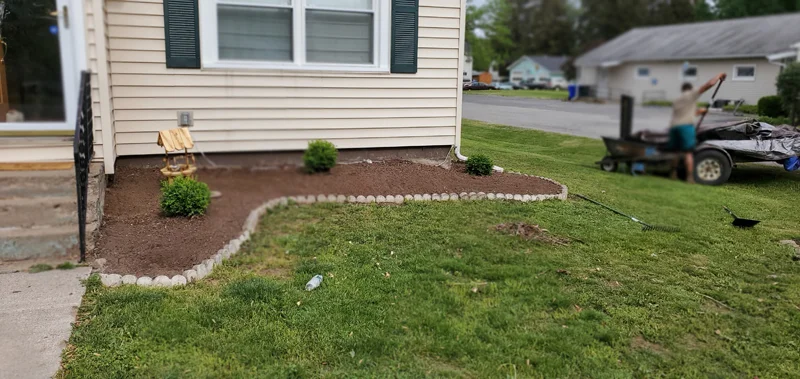 Mulch application and garden clean-up project completed by Diamond Landscape & Design.