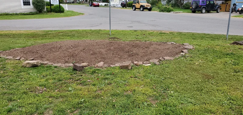 Mulch application and garden clean-up project completed by Diamond Landscape & Design.