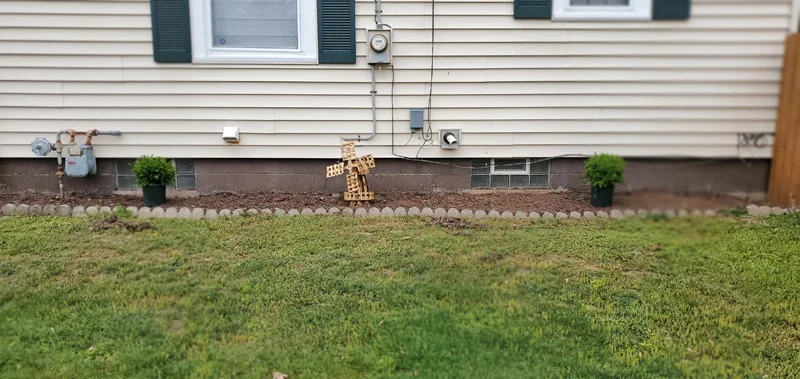 Mulch application and garden clean-up project completed by Diamond Landscape & Design.