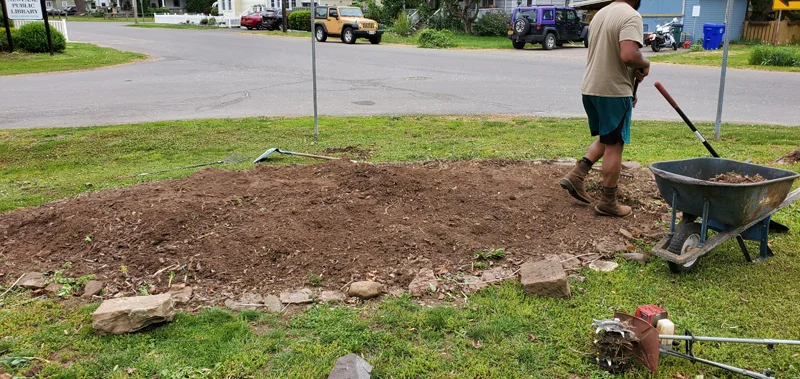 Mulch application and garden clean-up project completed by Diamond Landscape & Design.