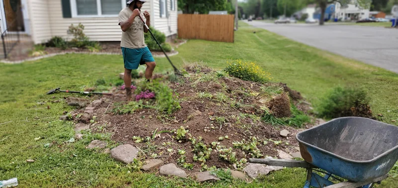 Mulch application and garden clean-up project completed by Diamond Landscape & Design.