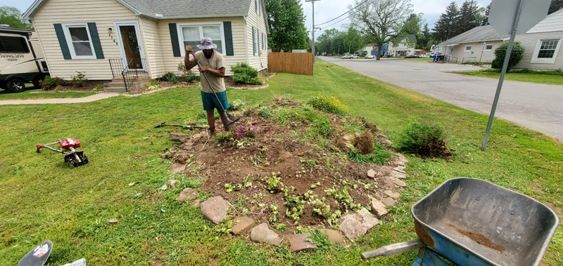 Mulch application and garden clean-up project completed by Diamond Landscape & Design.