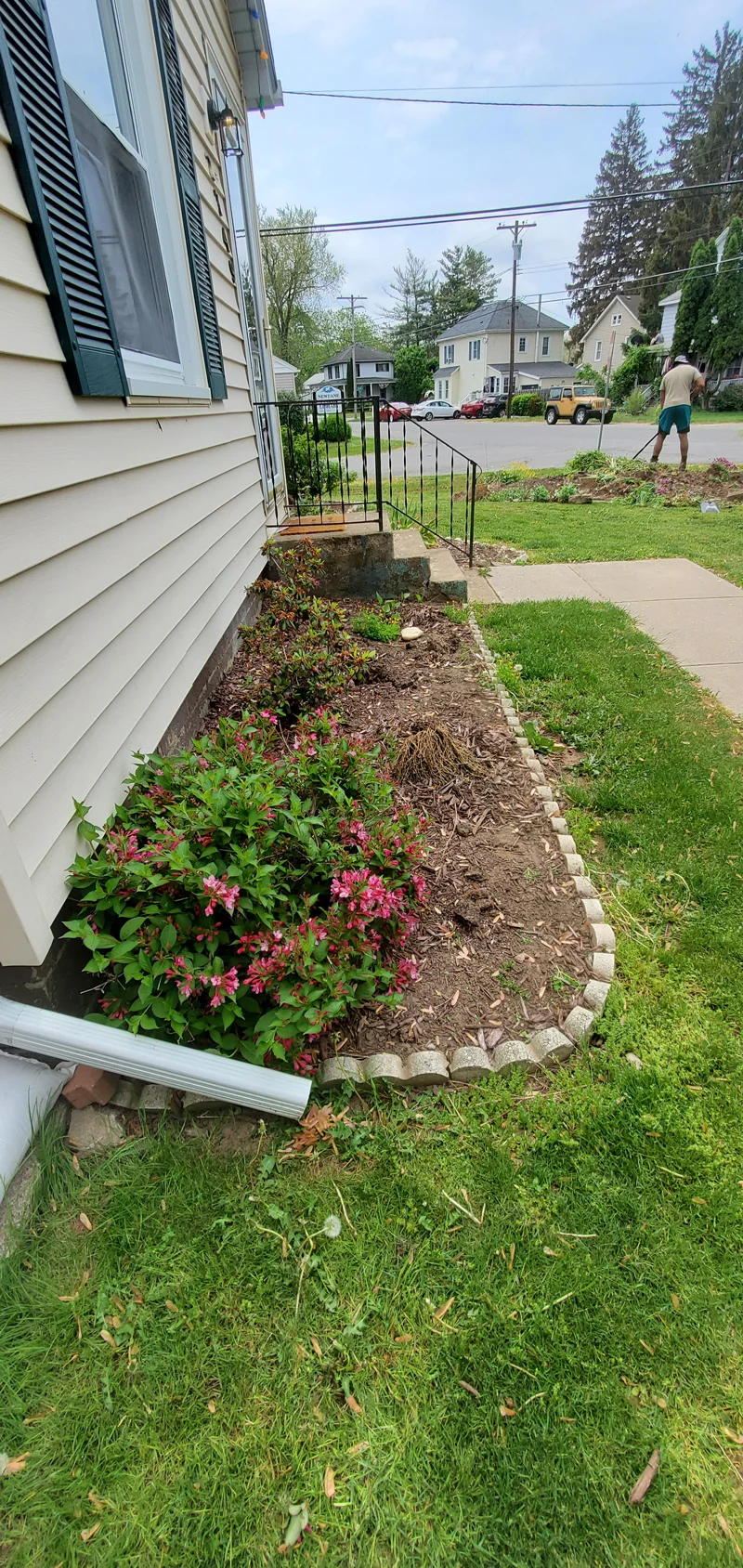 Mulch application and garden clean-up project completed by Diamond Landscape & Design.
