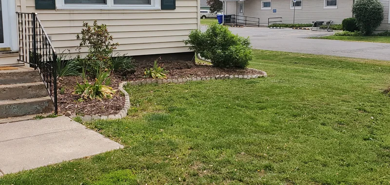 Mulch application and garden clean-up project completed by Diamond Landscape & Design.