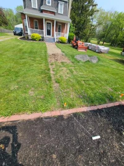 Brick path installation project completed by Diamond Landscape & Design.