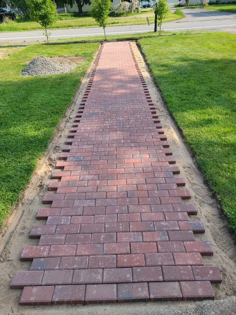 Brick path installation project completed by Diamond Landscape & Design.