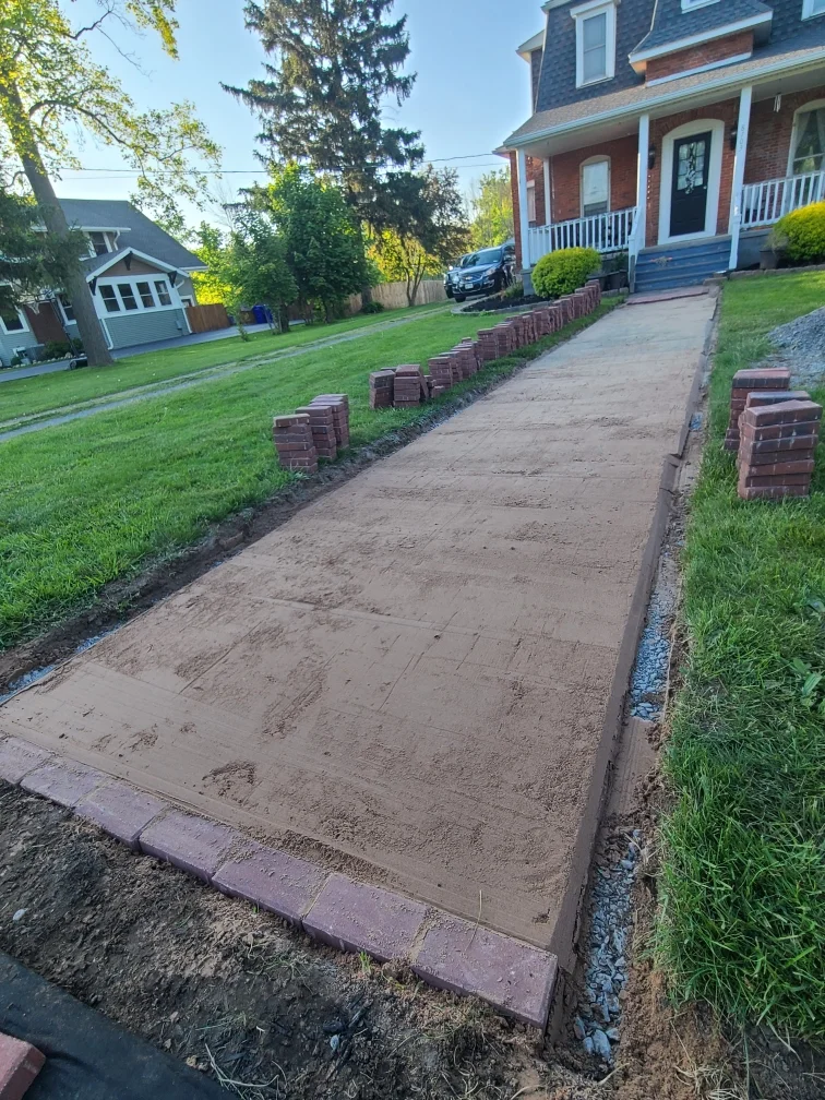 Brick path installation project completed by Diamond Landscape & Design.