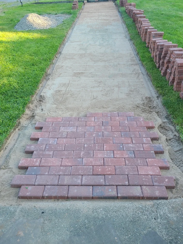 Brick path installation project completed by Diamond Landscape & Design.