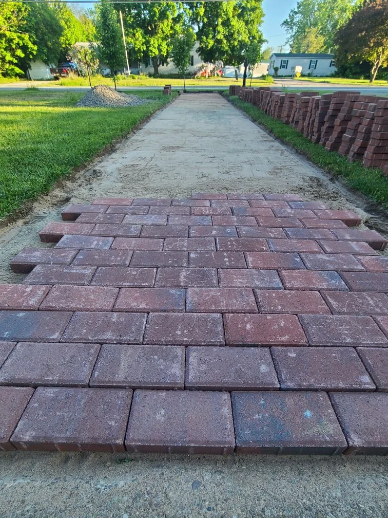 Brick path installation project completed by Diamond Landscape & Design.