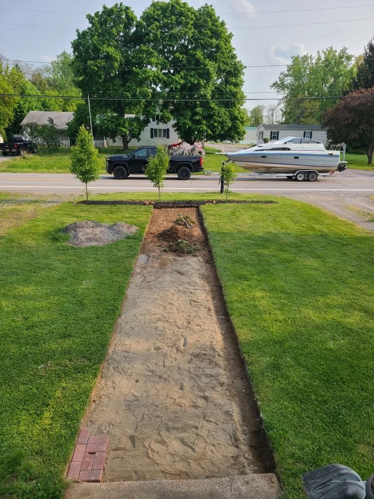 Brick path installation project completed by Diamond Landscape & Design.