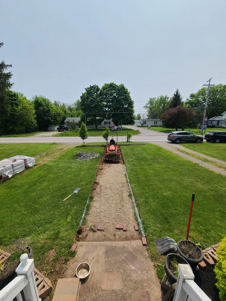 Brick path installation project completed by Diamond Landscape & Design.